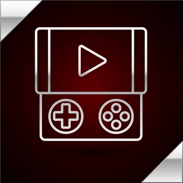 Silver line Portable video game console icon isolated on dark red background. Gamepad sign. Gaming concept. Vector Illustration — Stock Vector