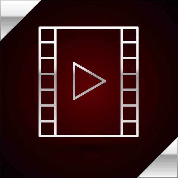 Línea de plata Reproducir icono de vídeo aislado sobre fondo rojo oscuro. Película de tira con señal de juego. Ilustración vectorial — Archivo Imágenes Vectoriales