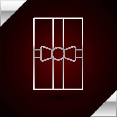 Gümüş çizgili hediye kutusu simgesi koyu kırmızı arka planda izole edilmiş. Mutlu Noeller ve mutlu yıllar. Vektör İllüstrasyonu