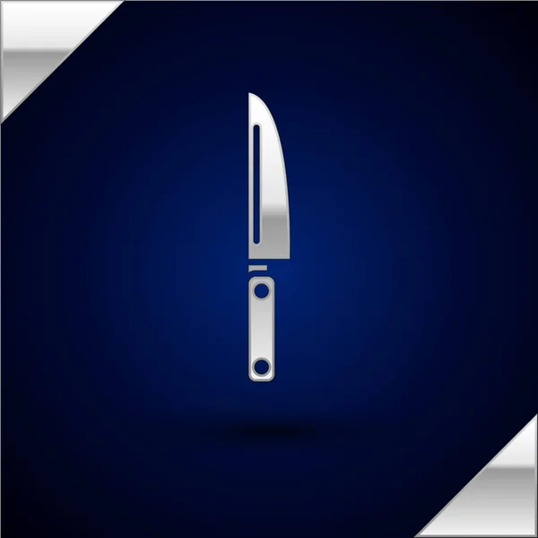 Icono de cuchillo de plata aislado sobre fondo azul oscuro. Símbolo de cubertería. Ilustración vectorial — Vector de stock