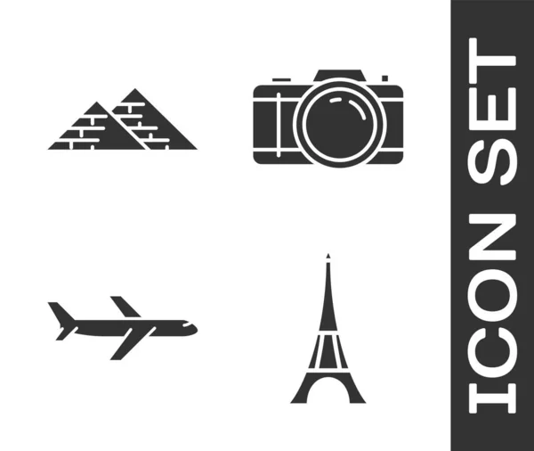 Set Eiffelturm, ägyptische Pyramiden, Flugzeug und Fotokamera-Symbol. Vektor — Stockvektor