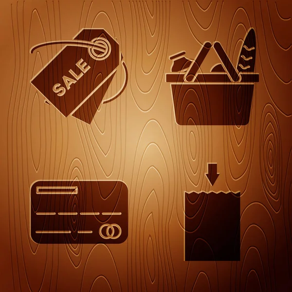 Set Einkaufstasche aus Papier, Preisschild mit Aufschrift Verkauf, Kreditkarte und Warenkorb und Lebensmittel auf Holzgrund. Vektor — Stockvektor