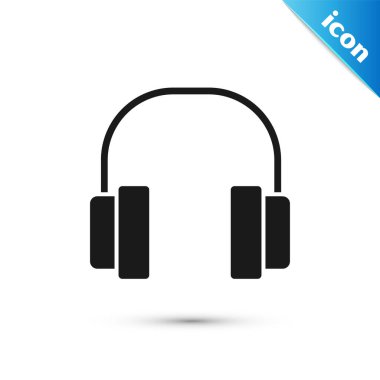 Siyah kulaklık simgesi beyaz arkaplanda izole edilmiş. Kulaklıklar. Müzik, hizmet, iletişim ve operatör konsepti. Vektör İllüstrasyonu