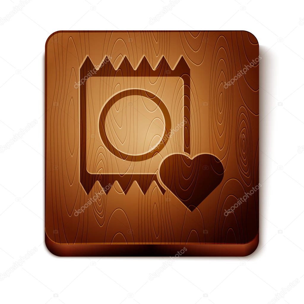 Brown Condom in package icon isolated on white background. Safe love symbol. Contraceptive method for male. Wooden square button. Vector Illustration