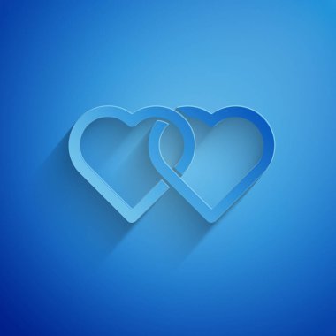 Paper cut Two Linked Hearts icon isolated on blue background. Romantic symbol linked, join, passion and wedding. Valentine day. Paper art style. Vector Illustration