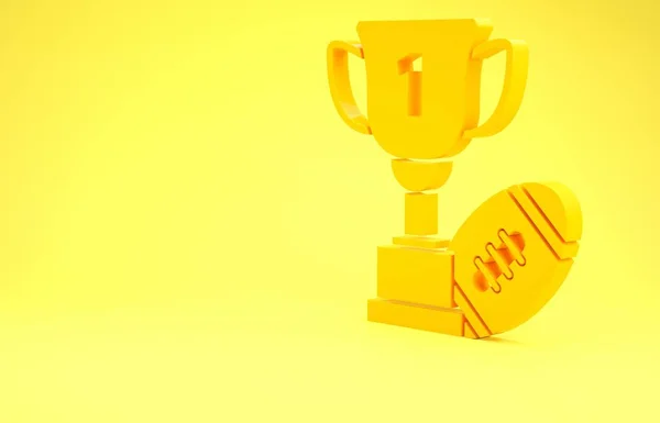 Coppa Premio Giallo e icona della palla da football americano isolato su sfondo giallo. Simbolo del trofeo vincente. Campionato o trofeo di competizione. Concetto minimalista. Illustrazione 3d rendering 3D — Foto Stock