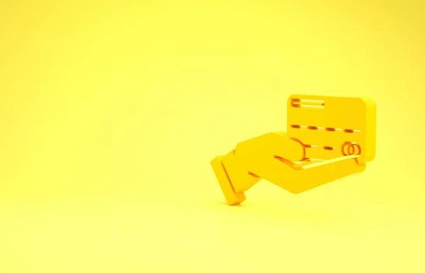 Yellow Human hand holding met credit card icoon geïsoleerd op gele achtergrond. Online betaling. Betaal per kaart. Financiële verrichtingen. Minimalisme concept. 3d illustratie 3d renderen — Stockfoto