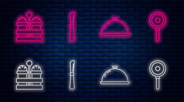 Sıralı bıçak, tepsi dolusu yiyecek, tuz, biber ve kızartma tavasıyla kaplı. Tuğla duvarda parlayan neon simgesi. Vektör