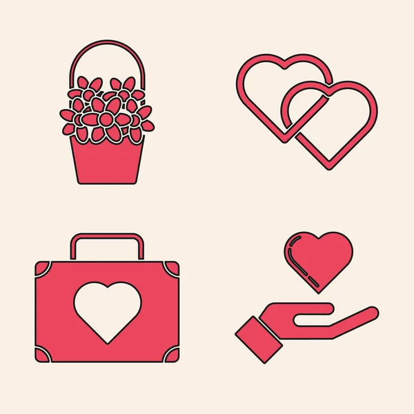 Set srdce na ruce, Květiny v košíku, Dvě propojená srdce a kufr pro cestování s ikonou srdce. Vektor — Stockový vektor