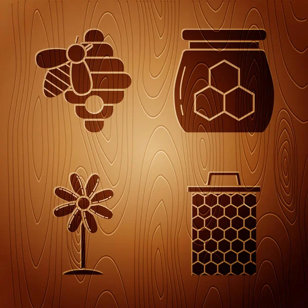 Set Honeycomb, Hive for bees, Flower and Jar of honey on wooden background. Vector — Stock Vector