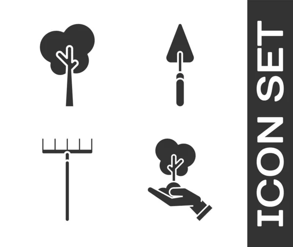 Set Tree in hand of environmental protection, Tree, Garden rake and Garden trowel spade or shovel icon. Vector — 스톡 벡터