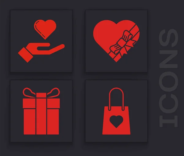 Set Sac shopping avec coeur, Coeur à portée de main, Boîte en forme de coeur bonbons et icône de boîte arc et cadeau. Vecteur — Image vectorielle