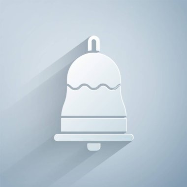 Kağıt kesiği Gri arkaplanda izole edilmiş zil simgesi. Alarm sembolü, servis zili, el zili işareti, uyarı sembolü. Kağıt sanatı tarzı. Vektör İllüstrasyonu