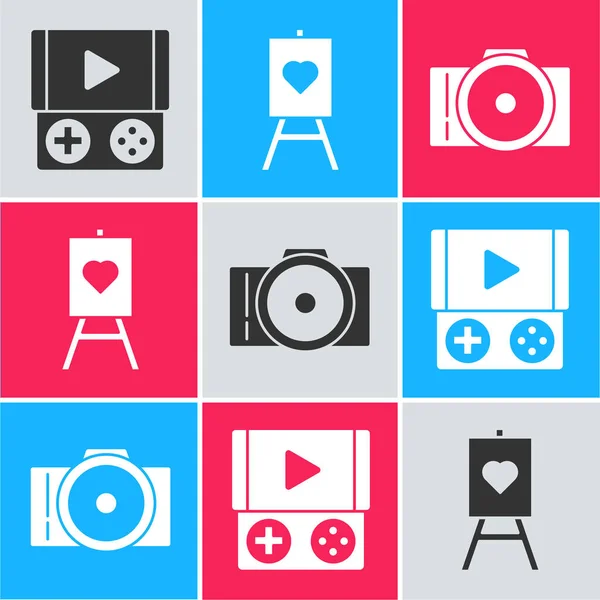 Set Portable video game console, Wood easel or painting art boards and Photo camera icon. Vector