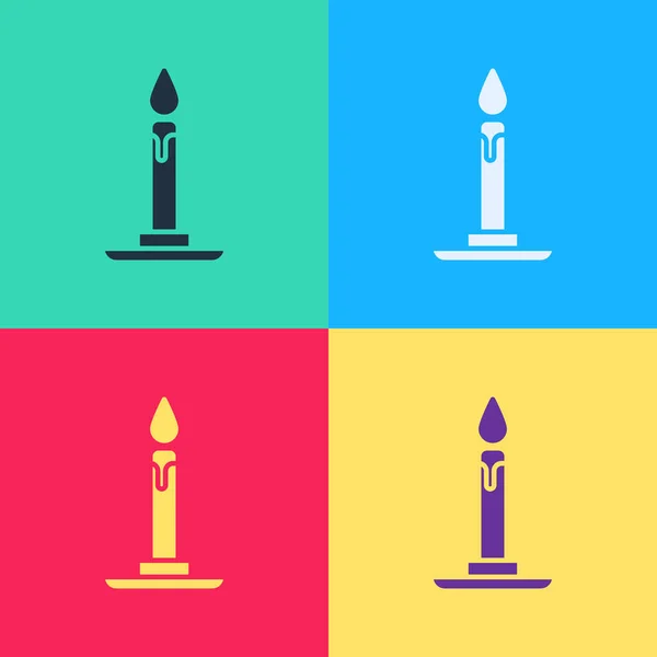 Pop art Burning candle in candlestick icon isolated on color background. Cylindrical candle stick with burning flame. Vector Illustration — Stock Vector