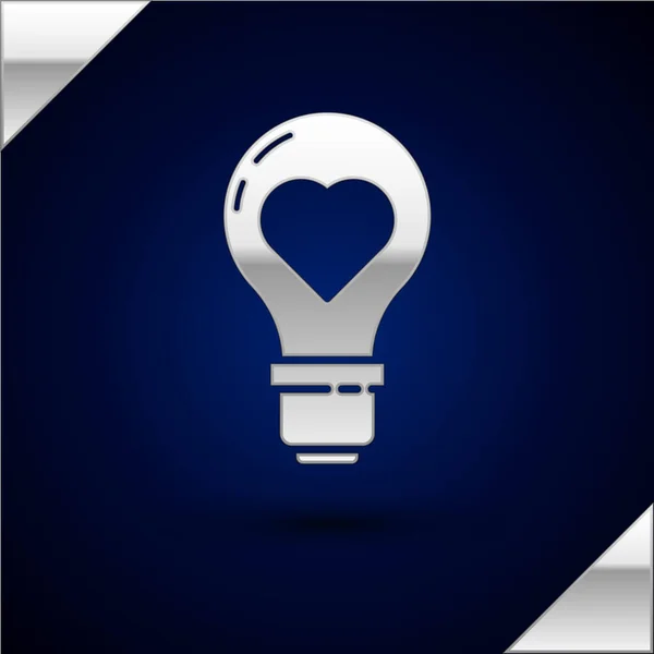 Silver Heart shape in a light bulb icon isolated on dark blue background. Love symbol. Valentine day symbol. Vector Illustration — Stock Vector