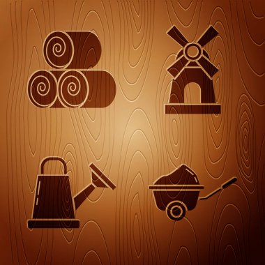El arabasını toprak, saman rulosu, su kovası ve ahşap arka planda yel değirmeni ile ayarla. Vektör