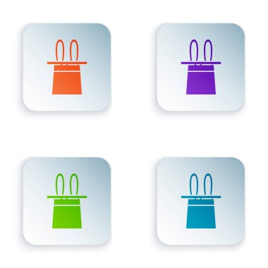 Beyaz arka planda izole edilmiş renkli sihirbaz şapkası ve tavşan kulağı simgesi. Sihir numarası. Gizemli eğlence konsepti. Kare düğmelere renkli simgeleri yerleştir. Vektör İllüstrasyonu