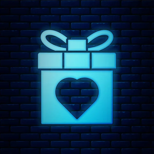 Glowing Neon Gift Box Heart Icon Isolated Brick Wall Background — Stock Vector