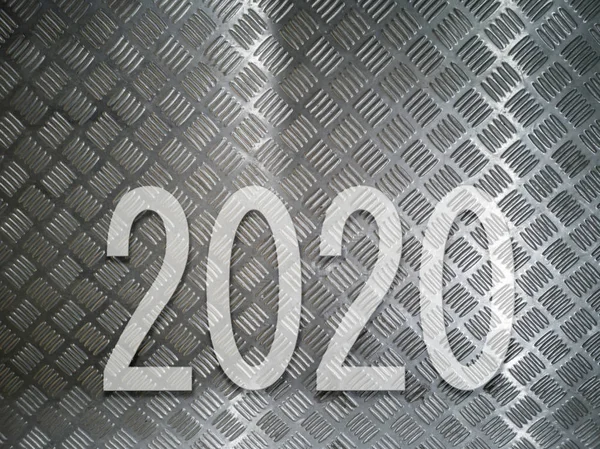 Conceito ano de texto 2020 sobre padrão de metal . — Fotografia de Stock