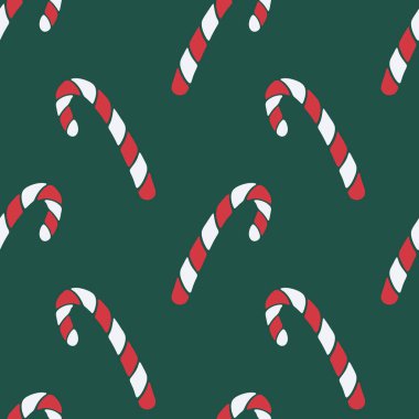 Koyu yeşil arka planda elle çizilmiş noel şekerleri ile vektörsüz desen
