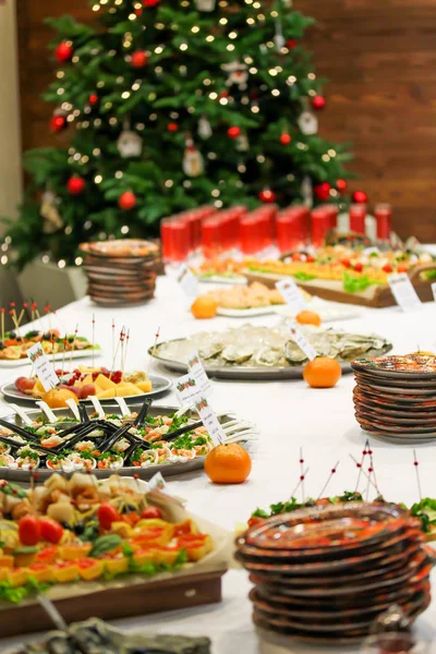 Christmas dishes and snacks at the party — Stock Photo, Image