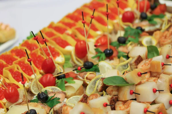 A plate with snacks at the party — Stock Photo, Image