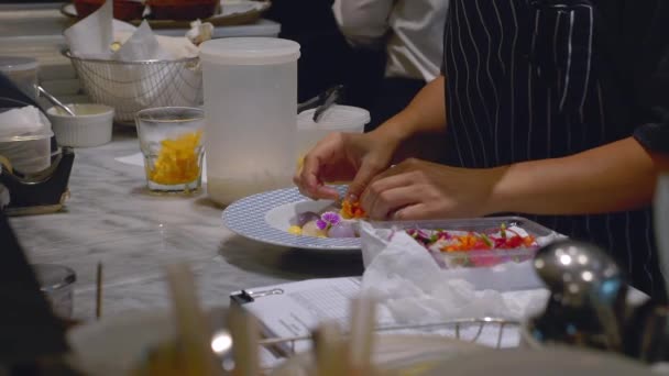Womens Hands Are Preparing and Decorating Flowers Thai Dessert on Plate — 비디오