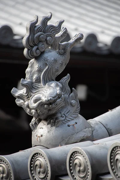 stock image A picture of a karajishi (Chinese lion) ornament placed on the roof, said to deflect evil and disaster.    Kyoto Japan