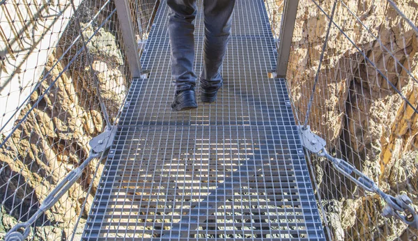 Trekking shoes on suspension bridge at Caminito del Rey — Stock Photo, Image