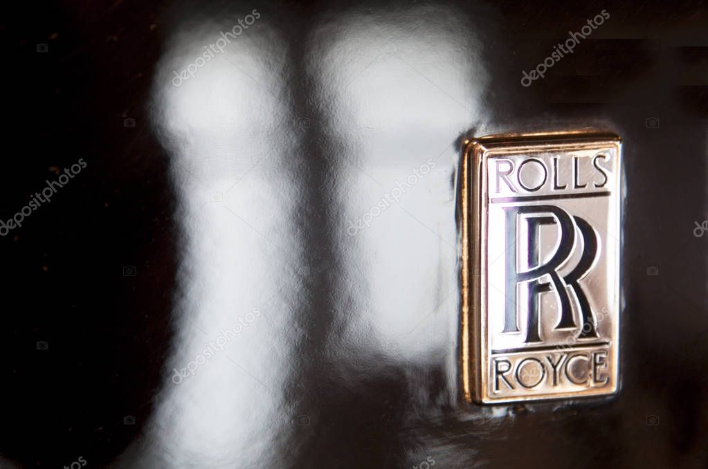 Malaga, Spain - December 4, 2016:  Rolls Royce Logo brand outside Car. Displayed at Museo Automovilistico in Malaga , Spain