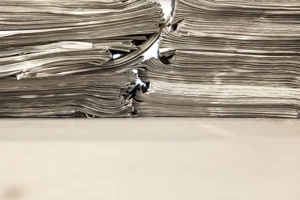 Two huge pile of many newspapers — Stock Photo, Image