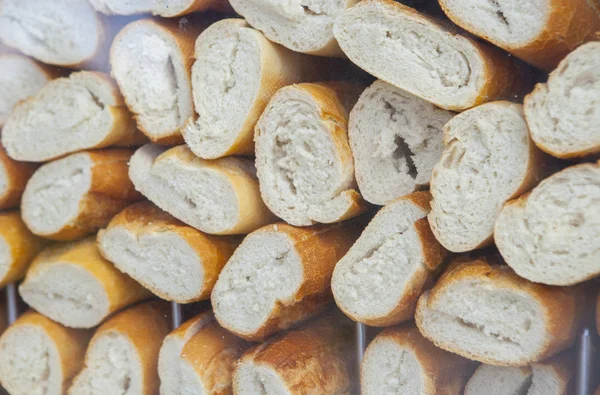Empty and sliced spanish bocadillos bread ready for fill — Stock Photo, Image
