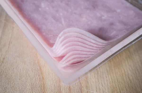 Opakowanie po placu w kształcie plasterki szynki dla sandwich — Zdjęcie stockowe