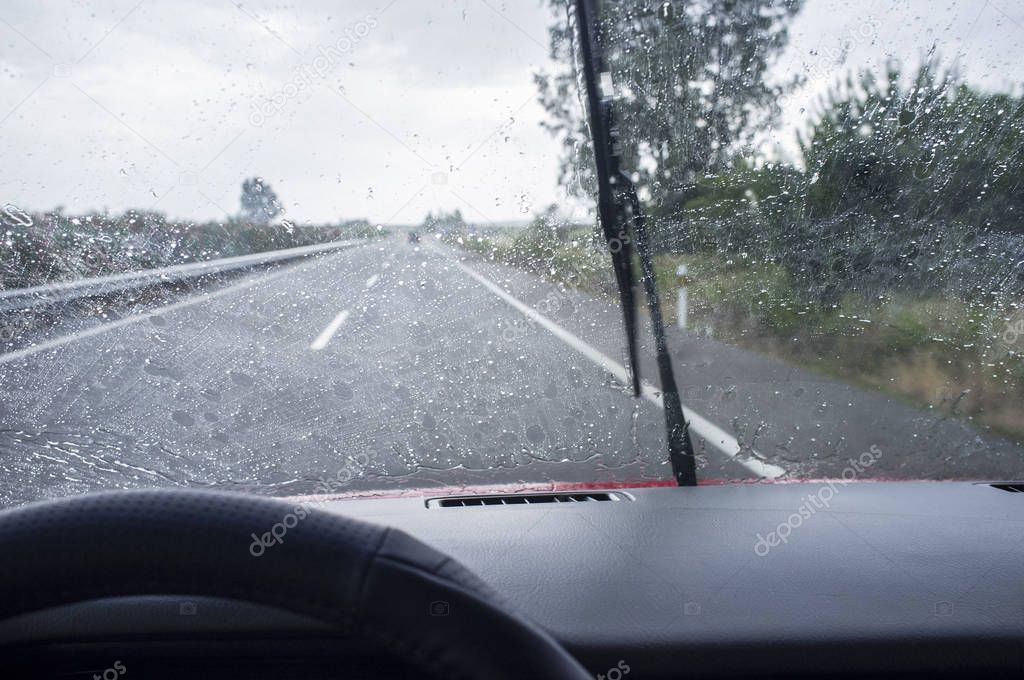 Driving on a highway in the rain