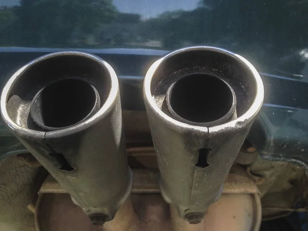 Double exhaust pipes from a car — Stock Photo, Image