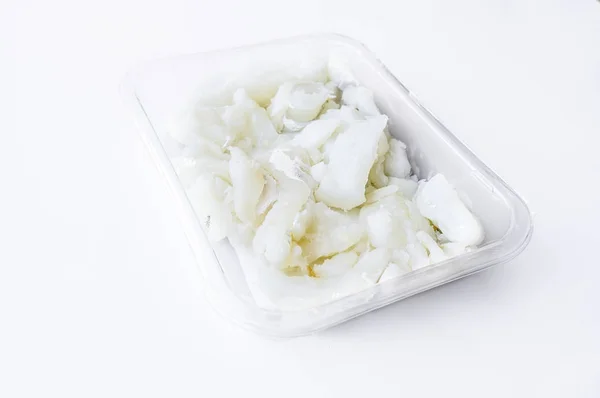 Packed tray with desalted slices of codfish — Stock Photo, Image