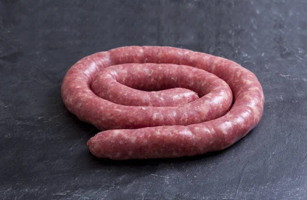 Rolled Uncooked Botifarra Catalan Sausage Isolated Black Slate — Stock Photo, Image