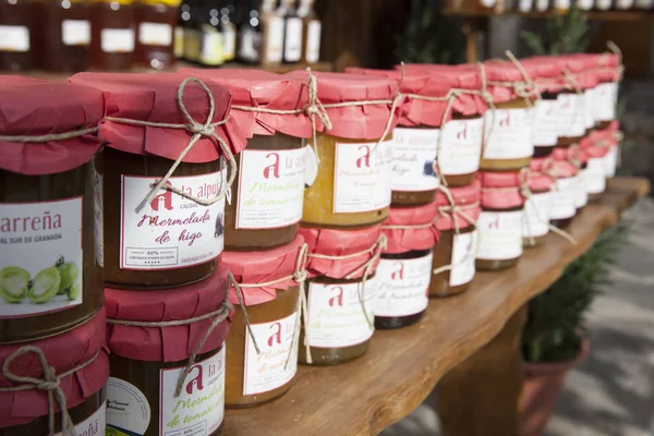 Traditional marmalade bottles for sell at  quiet street of Alpuj — Stock Photo, Image