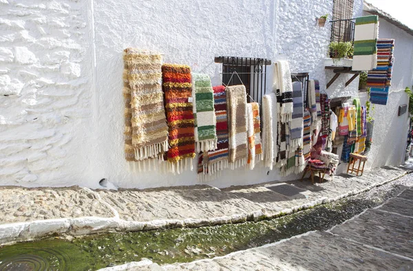 Jarapas displayed over walls of handicraft shop — Stock Photo, Image