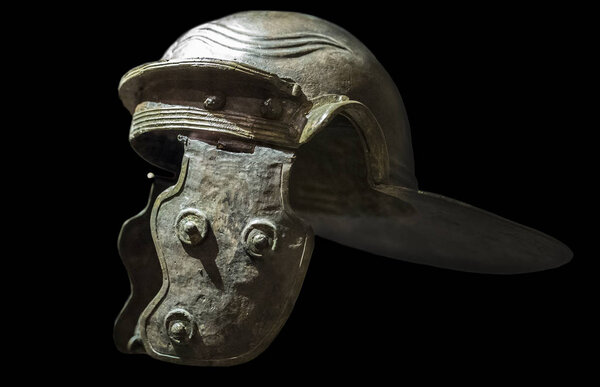 Galea or Roman soldier helmet. Isolated over black