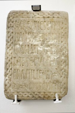 Mozarabic marble tombstone carved with epitaph, 11th Century AC clipart