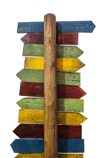Flerfärgad pole guidepost med massor av destinationer pilar — Stockfoto