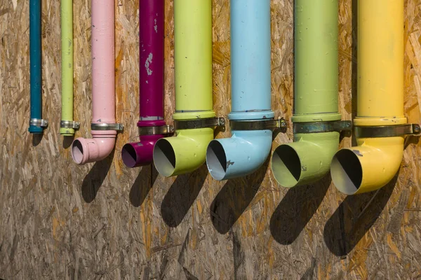 Plastic Sewer Pipes Painted Yellow Green Blue Red Pink Colors — Stock Photo, Image
