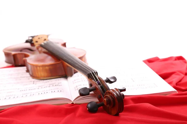 Violín Sobre Tela Roja Con Notas Musicales — Foto de Stock