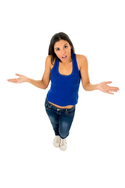 Hispanic woman shrinking shoulders open arms wondering confused in doubt — Stock Photo, Image