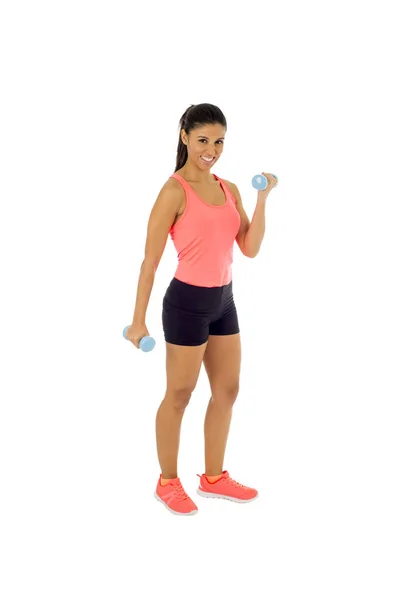 Attractive happy latin woman holding weight dumbbell doing fitness workout — Stock Photo, Image