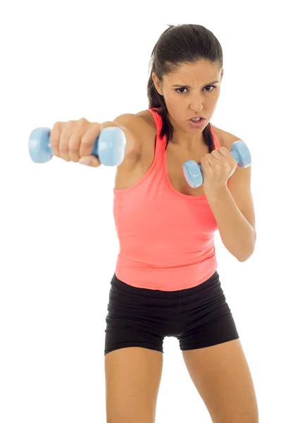 Beautiful latin woman in sport clothes working hard holding weight dumbbell doing fitness workout — Stock Photo, Image