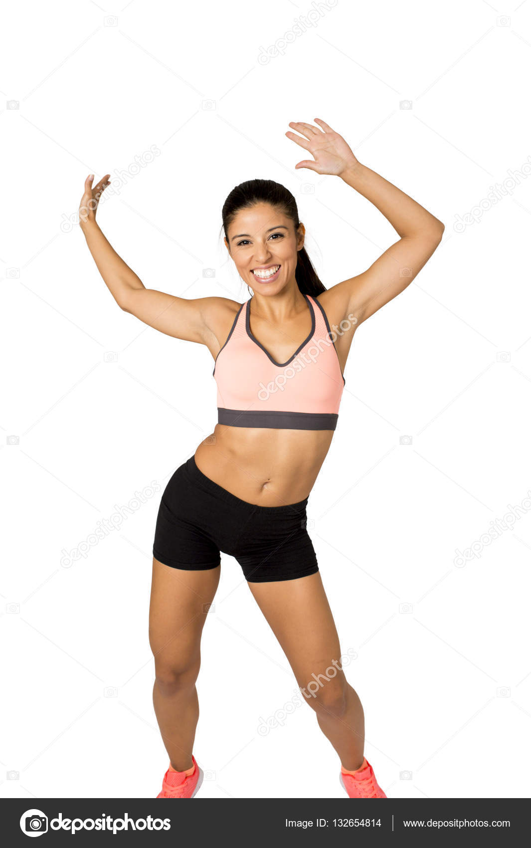 parachute medeleerling Grappig Young beautiful latin woman in fitness clothes dancing zumba in aerobic  workout happy and excited Stock Photo by ©focuspocusltd 132654814