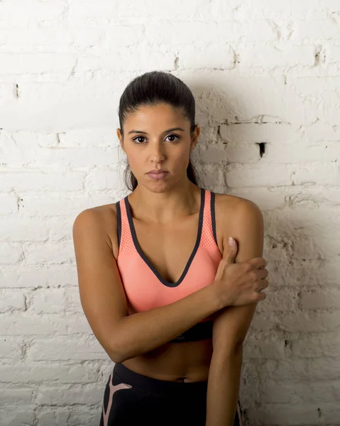 Latin sport woman posing in fierce and badass face expression with fit slim body — Stock Photo, Image